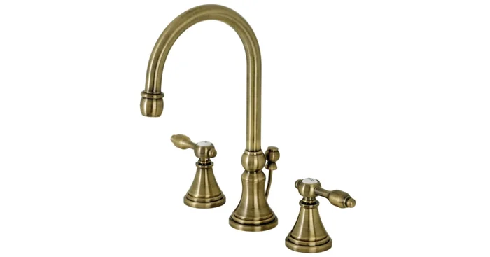 Kingston Brass Tudor 1.2 GPM Deck Mounted Widespread Bathroom Faucet with Pop-Up Drain Assembly